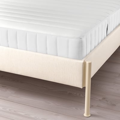 A modern upholstered bed frame with adjustable sides, clean lines, and a padded headboard. Legs are positioned externally.