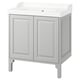 Modern light grey bathroom vanity. Double door cabinet, rectangular white sink. Clean, minimalist design.