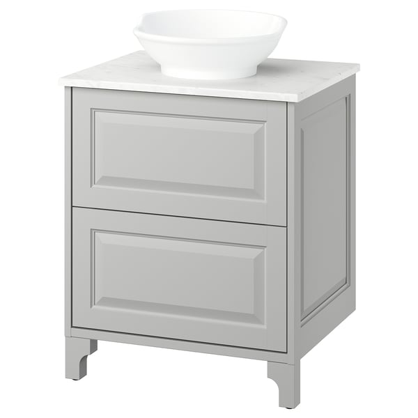 A light grey TÄNNFORSEN bathroom vanity with a marble countertop and a white bowl sink. It has two drawers and is wall-mountable.