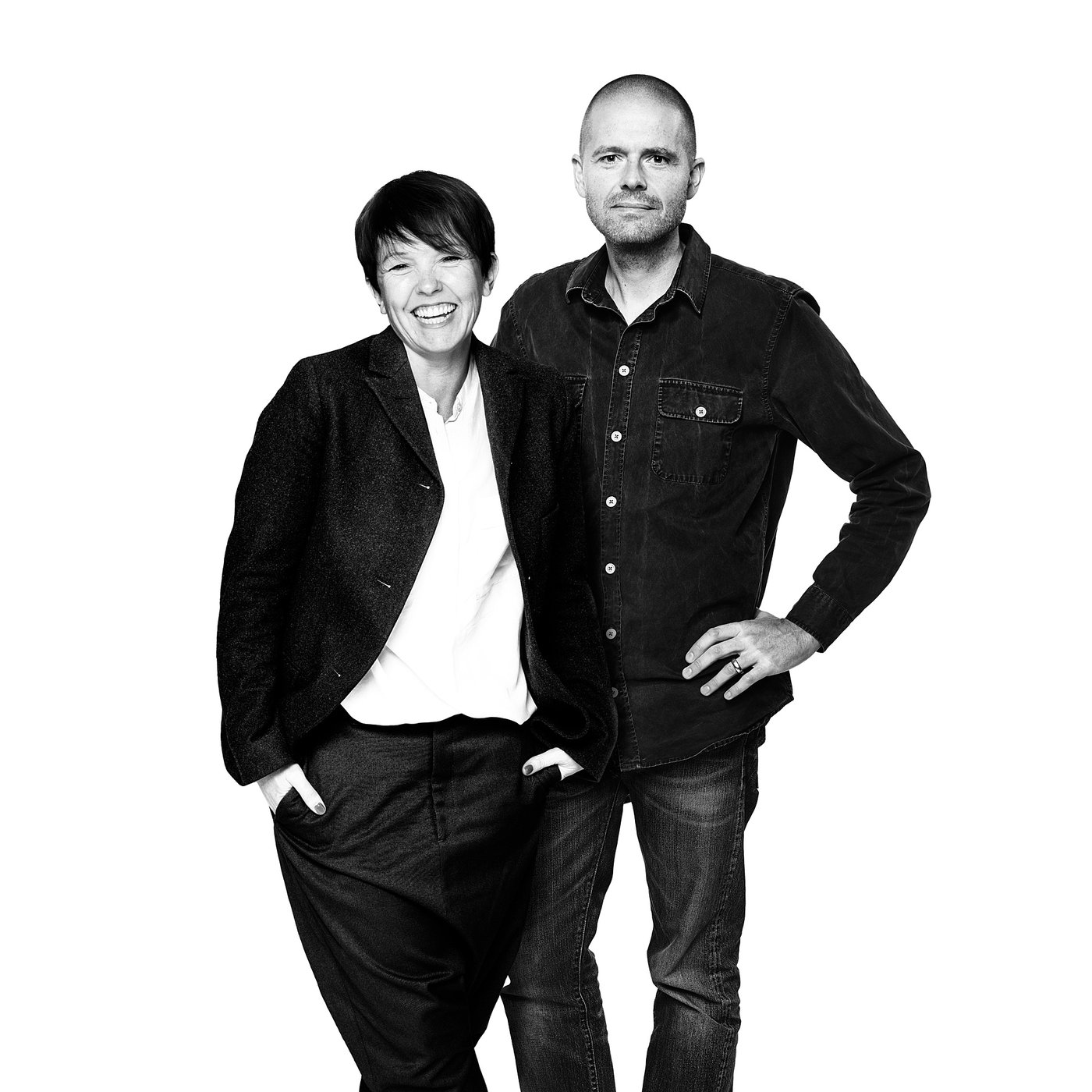 Black and white photo of O Wihlborg and E Lilja Löwenhielm posing together, smiling in casual attire.