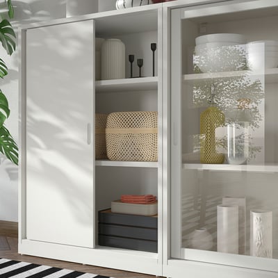 TONSTAD Storage combination w sliding doors, off-white/clear glass, 79x14 5/8x45 1/2 "