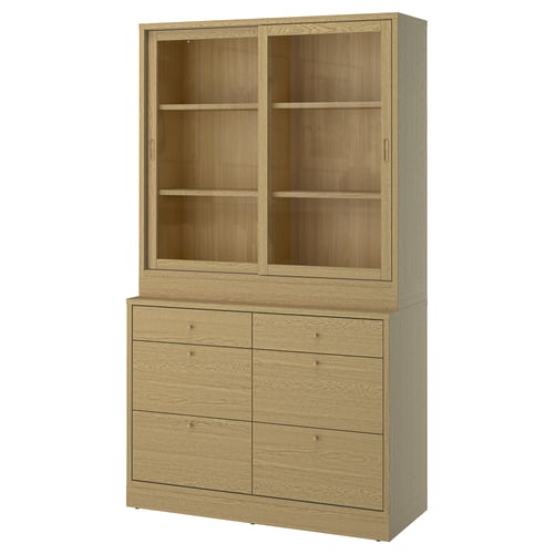 Tall wooden cabinet with glass doors and drawers, light oak finish, sleek design.