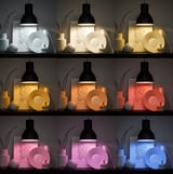 TRÅDFRI LED bulb E12 800 lm, wireless dimmable color and white spectrum/globe opal