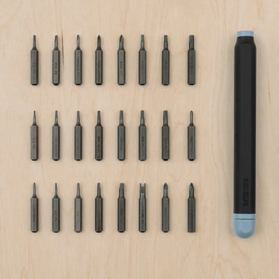 TRIXIG black screwdriver bits set, magnetic, various sizes, stored in blue and black case.
