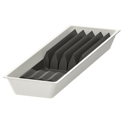 White and black plastic utensil tray with rectangular compartments.