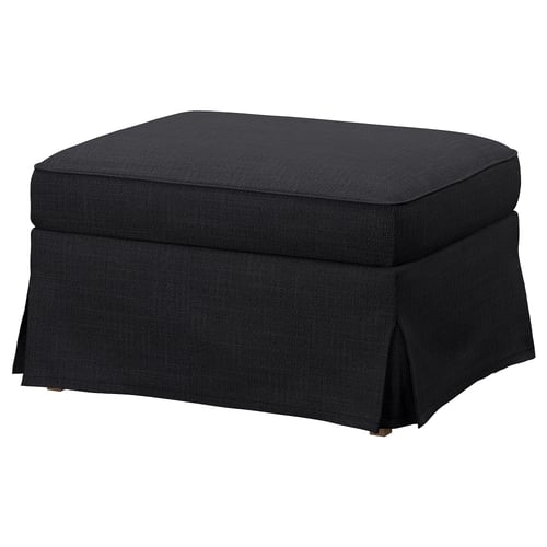 Black upholstered ottoman, rectangular, tufted design with removable cover, ideal for resting feet or extra seating.