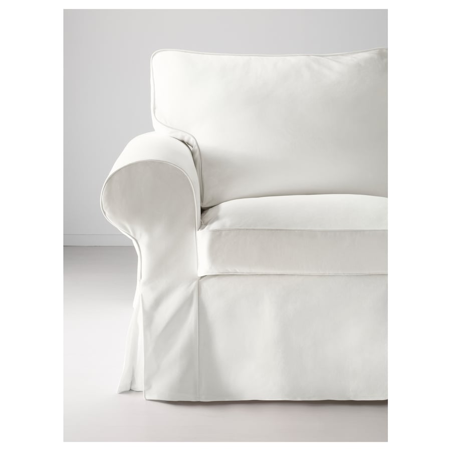 Elegant UPPLAND sofa, pure white, plush cushions, modern design, cosy & inviting.