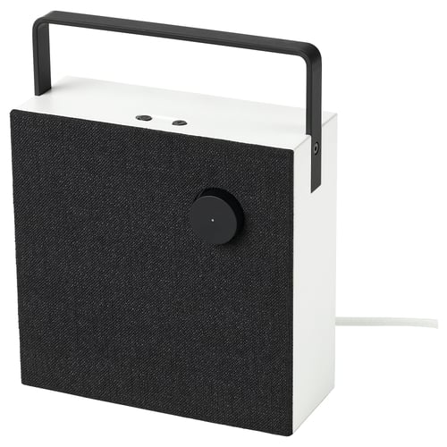 Bluetooth speaker: white, fabric front, black handle, modern.