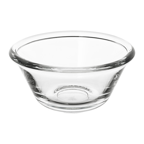 Clear glass bowl, simple and round, no decorations, ideal for serving food.