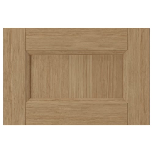 VEDHAMN natural wood cabinet door. Square shape with oak panel, solid oak frame. Warm, earthy tone.