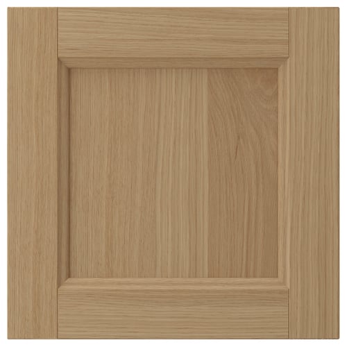 VEDHAMN wood cabinet door. Natural oak, square shape, simple panel design.