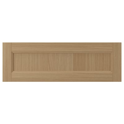 VEDHAMN natural oak kitchen drawer front with grooved design.