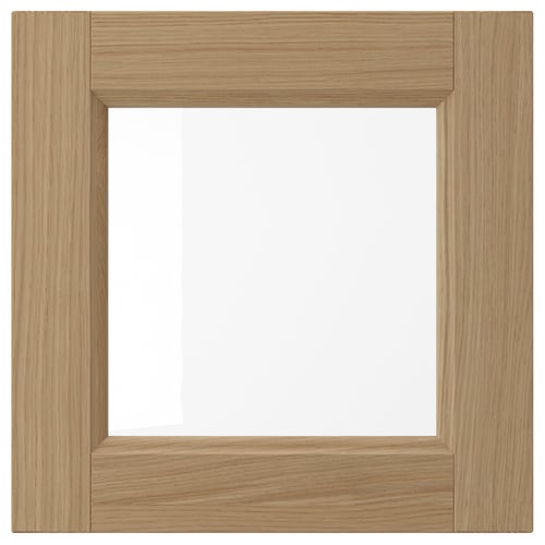 Light brown wooden photo frame, oak with glossy finish.