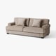 Comfortable beige sofa with rolled arms and three pillows.
