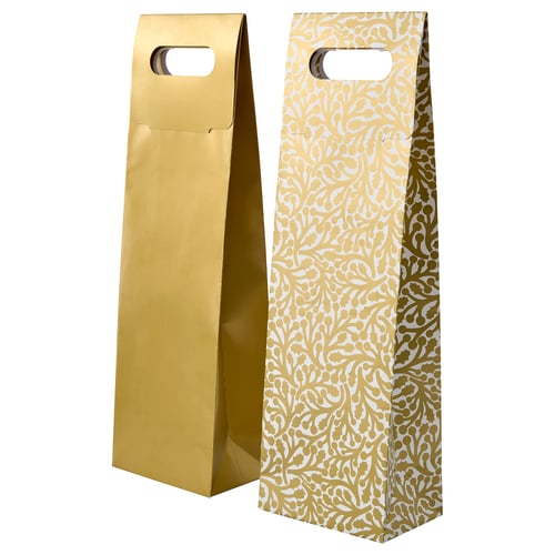 Two tall, gold-colored paper gift bags, plain and patterned, with handles.