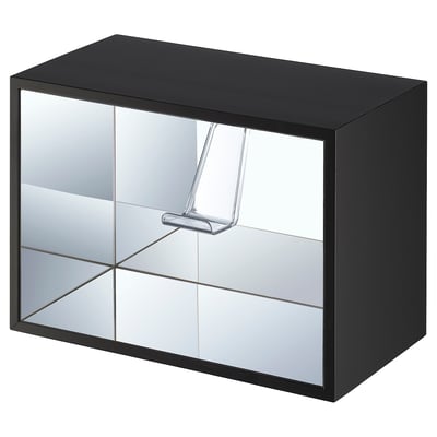 The YXSTABY, a sleek black cube-shaped shelf with mirror sides and clear plastic handles.